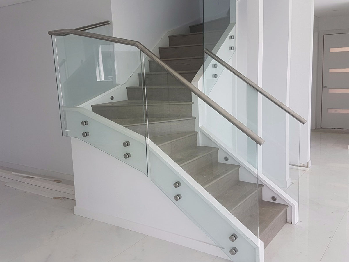 glass fencing with stainless steel handrail